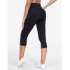 imageTHE GYM PEOPLE Womens Cross Waisted Stretchy Capri Denim Jeggings Tummy Control Skinny Jean Leggings with PocketsBlack