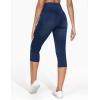imageTHE GYM PEOPLE Womens Cross Waisted Stretchy Capri Denim Jeggings Tummy Control Skinny Jean Leggings with PocketsDark Blue