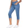 imageTHE GYM PEOPLE Womens Cross Waisted Stretchy Capri Denim Jeggings Tummy Control Skinny Jean Leggings with PocketsDenim Blue