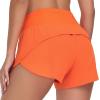 imageTHE GYM PEOPLE Womens High Waisted Running Shorts Quick Dry Athletic Workout Shorts with Mesh Liner Zipper PocketsOrange