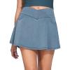 imageTHE GYM PEOPLE Womens Cross Waist Jean Skorts Stretchy Ruffle Denim Skirts with 2 in 1 Shorts PocketsDenim Light Blue