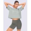imageTHE GYM PEOPLE 2 Pack Womens Workout Crop Tops Boxy Short Sleeve Athletic Running Basic Cropped TShirtsBlackGrey
