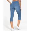 imageTHE GYM PEOPLE Womens High Waisted Stretchy Capri Jeggings Pants Tummy Control Pull on Skinny Jean Leggings with PocketsDenim Blue