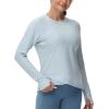 imageWomens Long Sleeve Compression Shirts Workout Tops Cross Hem Athletic Running Yoga TShirts with Thumb HoleLight Blue Heather
