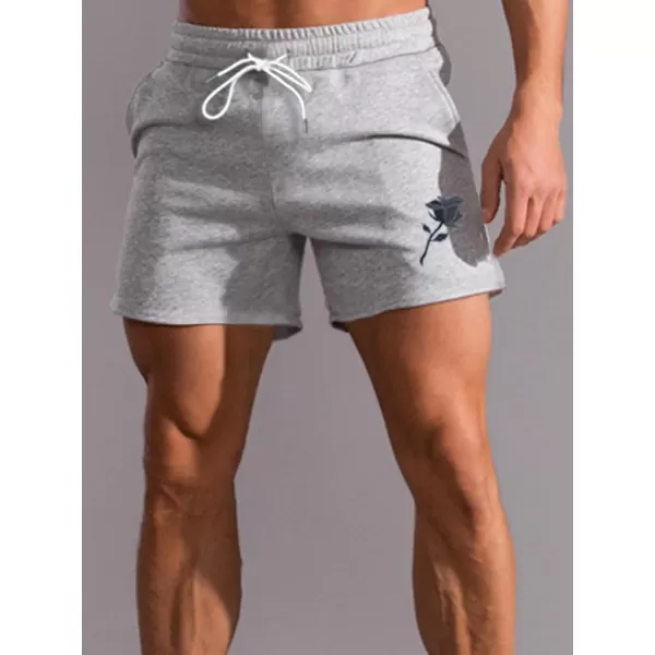 WDIRARA Men's Letter Graphic Print Drawstring Waist Tie Front Pocket Track Shorts
