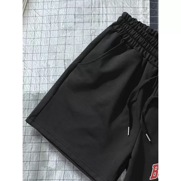 WDIRARA Men's Letter Graphic Print Drawstring Waist Tie Front Pocket Track Shorts