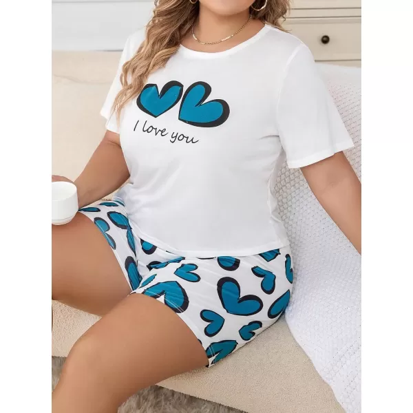 WDIRARA Women's Cartoon Cow Print Short Sleeve Tee and Shorts Pajama Set