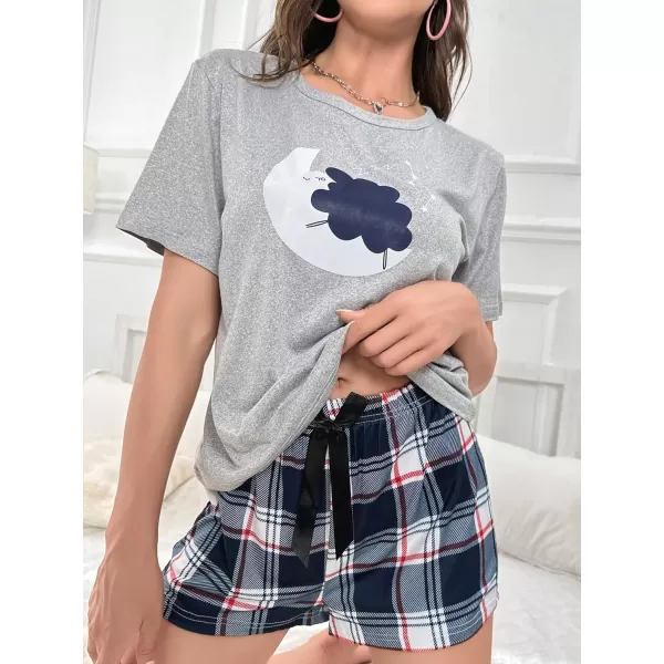 WDIRARA Women's Cartoon Cow Print Short Sleeve Tee and Shorts Pajama Set