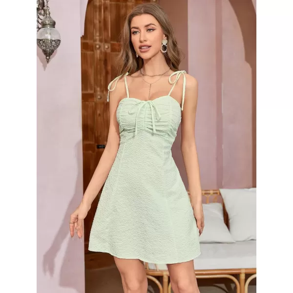 WDIRARA Women's Ditsy Floral Print Tie Shoulder Sleeveless Ruched Bust Drawstring Flared Hem Cami Mini Dress
