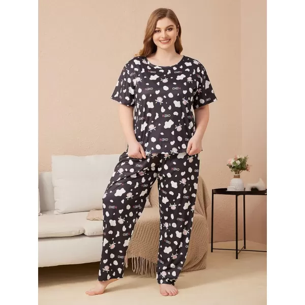 WDIRARA Women's Plus Size 2 Piece Sleepwear Cow Print Short Sleeve Top and Pants Pj Set