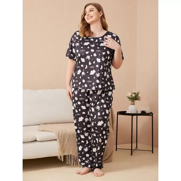 WDIRARA Women's Plus Size 2 Piece Sleepwear Cow Print Short Sleeve Top and Pants Pj Set