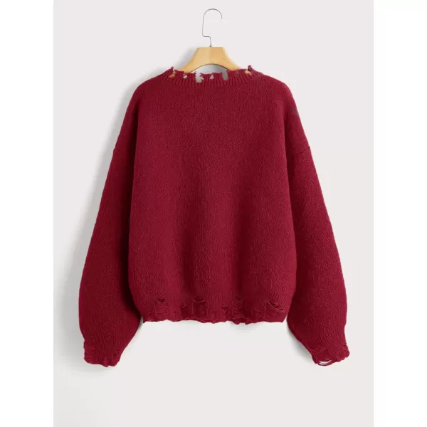 WDIRARA Women's Skeleton Patterned Distressed Long Sleeve Round Neck Pullover Sweaters