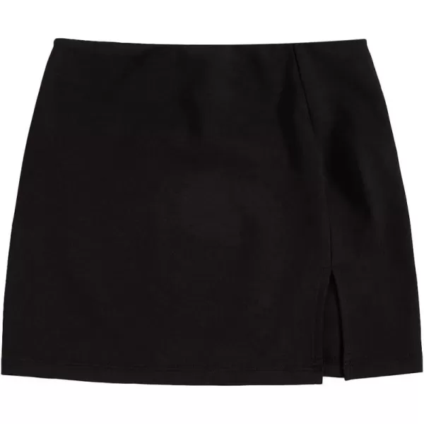 WDIRARA Girl's Cow Print Summer Split Hem High Waist Zipper Casual Mini Short Skirt