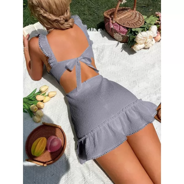 WDIRARA Women's Boho Backless Knot Ruffle Hem High Waist Trim Textured Mini Dress